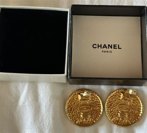 chanel gold button earrings|Chanel earrings original.